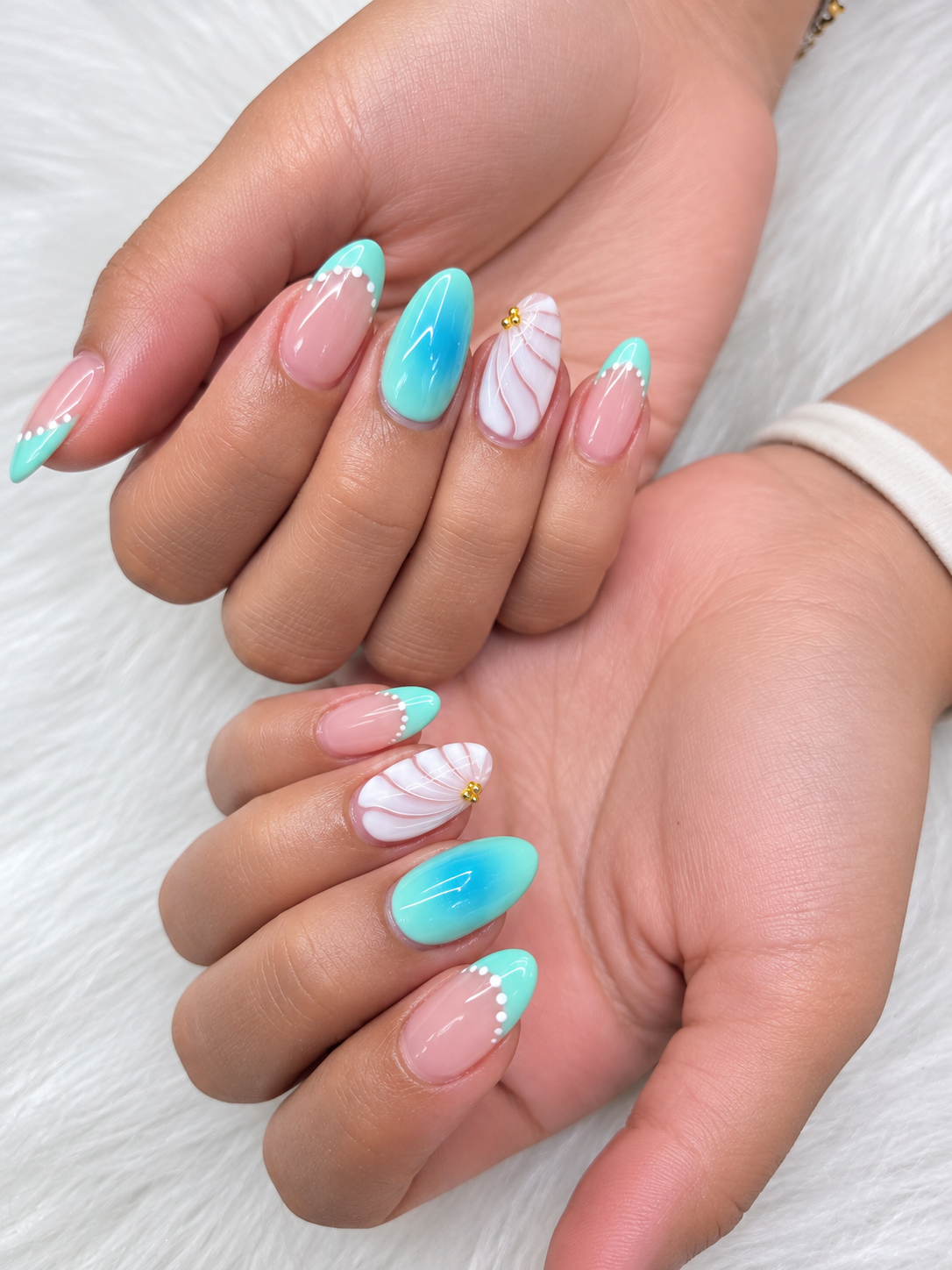 Teal ombre almond nails with white shell accent by AN Nail Spa Toronto